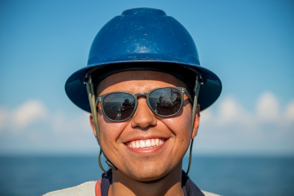 The crew aboard Coast Guard Cutter Axe