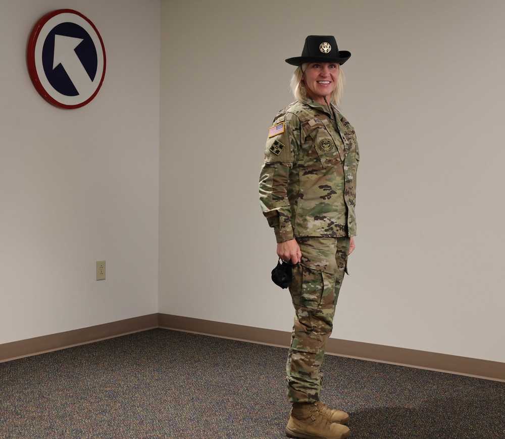 Staff Sgt. Michelle Ruland receives ARCOM