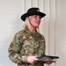 Staff Sgt. Michelle Ruland receives ARCOM