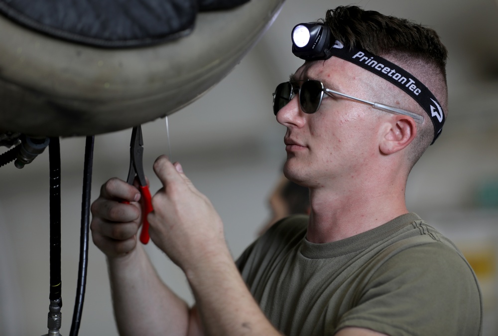 Soldiers with Task Force Raptor, B Co, 1st Battalion, 168th Aviation Regiment (GSAB) conduct maintenance operations at Camp Buehring