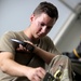 Soldiers with Task Force Raptor, B Co, 1st Battalion, 168th Aviation Regiment (GSAB) conduct maintenance operations at Camp Buehring