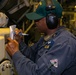 USS Sioux City Sailor Writes Notes on His Drill Package During MOB-E Drill