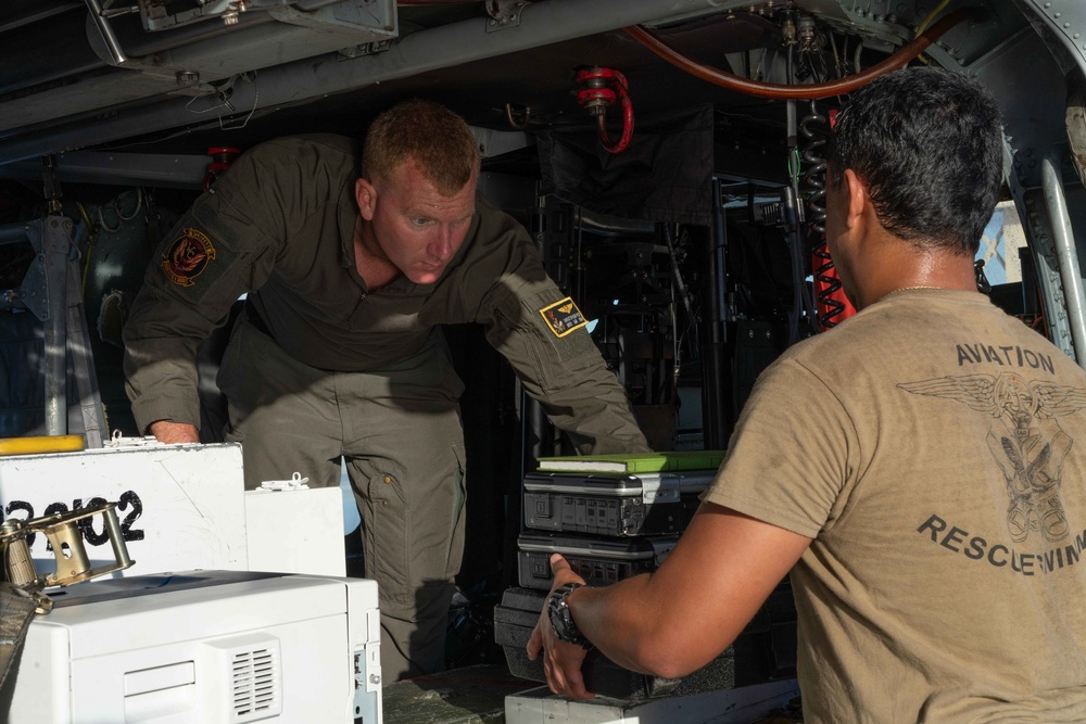 HSC-23 Sailors Load Gear