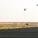 Chinook helicopters from C Co, 1-171 Aviation Regiment land at Camp Buehring