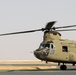 Chinook helicopters from C Co, 1-171 Aviation Regiment land at Camp Buehring