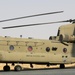 Chinook helicopters from C Co, 1-171 Aviation Regiment land at Camp Buehring