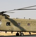 Chinook helicopters from C Co, 1-171 Aviation Regiment land at Camp Buehring