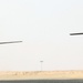 Chinook helicopters from C Co, 1-171 Aviation Regiment land at Camp Buehring