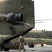 Chinook helicopters from C Co, 1-171 Aviation Regiment land at Camp Buehring