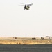 Chinook helicopters from C Co, 1-171 Aviation Regiment land at Camp Buehring