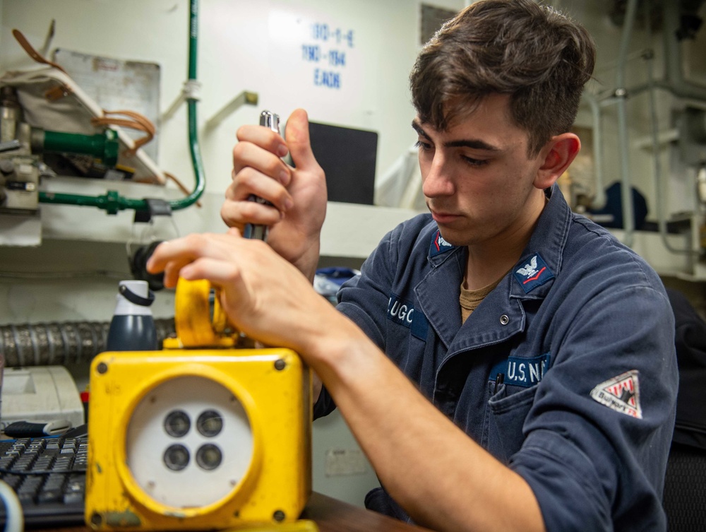 USS Carl Vinson (CVN 70) Sailor Conducts Maintenance in Indian Ocean