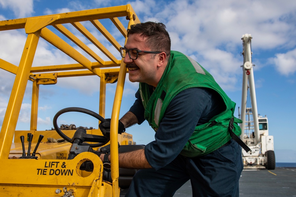 Makin Island Sailors Conduct Forklift Maintenance