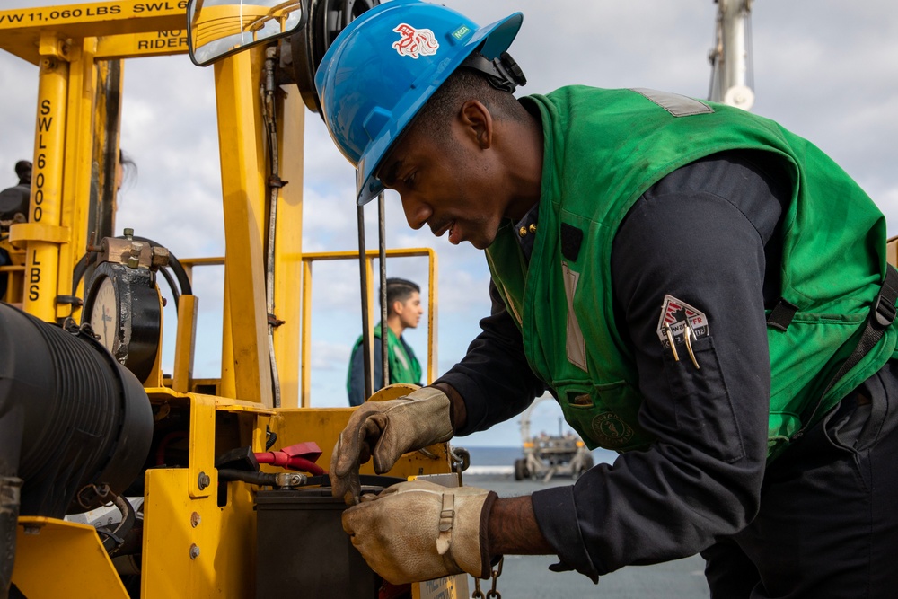 Makin Island Sailors Conduct Forklift Maintenance