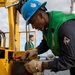 Makin Island Sailors Conduct Forklift Maintenance