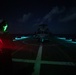 USS Sioux City Sailor Directs an MH-60S Sea Hawk Helicopter During Flight Ops