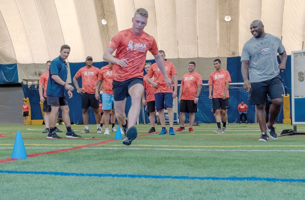 Honoring service members: 40 train with Denver Broncos