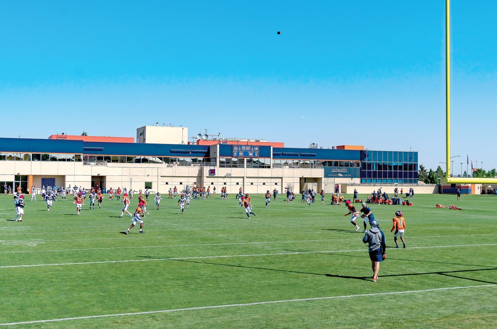 Honoring service members: 40 train with Denver Broncos