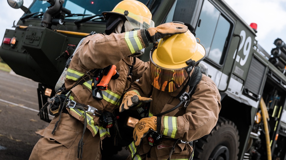 Distinguished Gentlemen Extinguish Small Fuel Fire Training