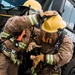 Distinguished Gentlemen Extinguish Small Fuel Fire Training