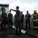 Distinguished Gentlemen Extinguish Small Fuel Fire Training