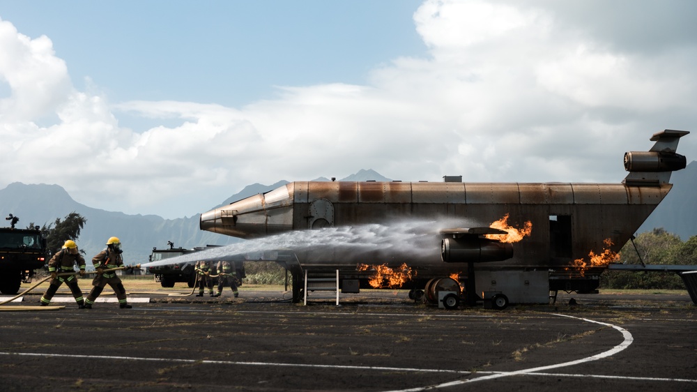 Distinguished Gentlemen Extinguish Small Fuel Fire Training