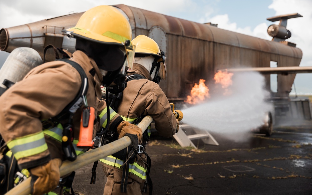 Distinguished Gentlemen Extinguish Small Fuel Fire Training