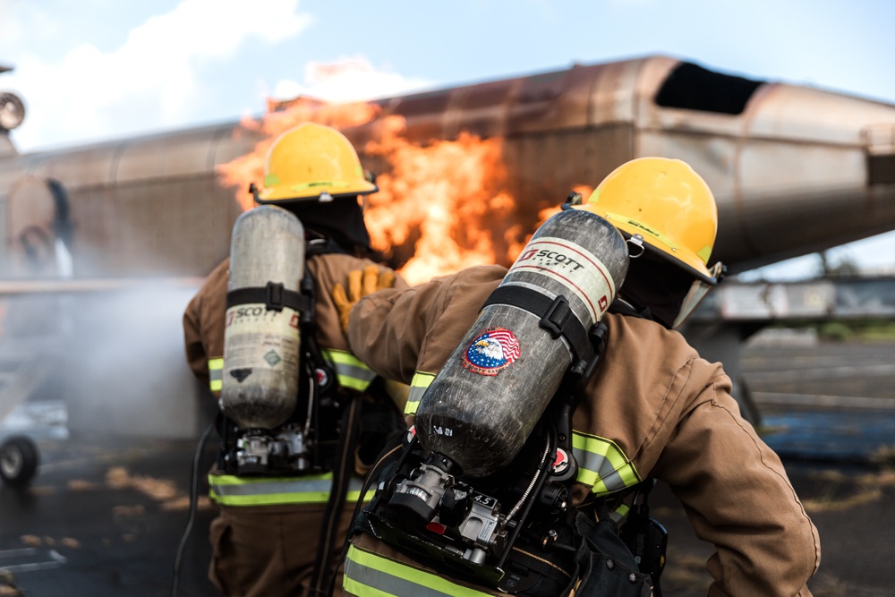 Distinguished Gentlemen Extinguish Small Fuel Fire Training