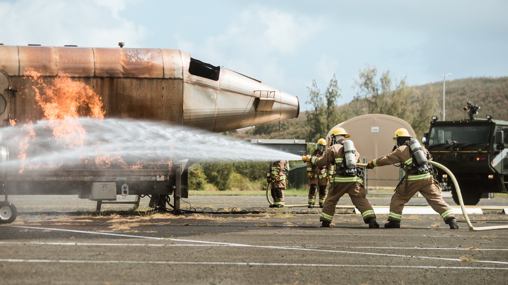 Distinguished Gentlemen Extinguish Small Fuel Fire Training