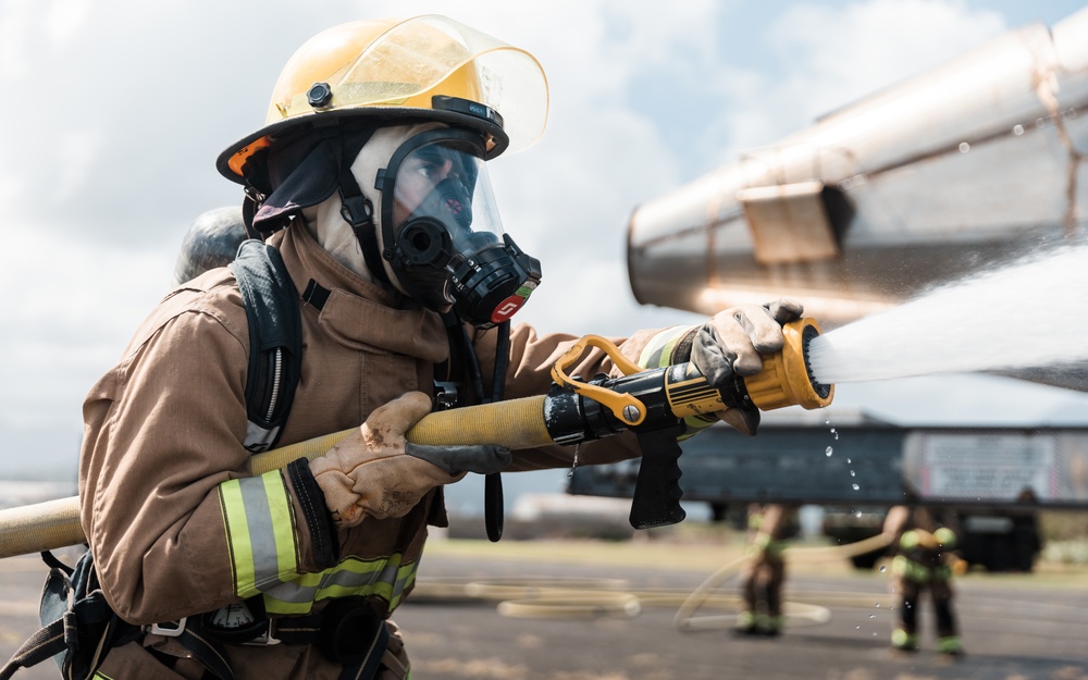 Distinguished Gentlemen Extinguish Small Fuel Fire Training