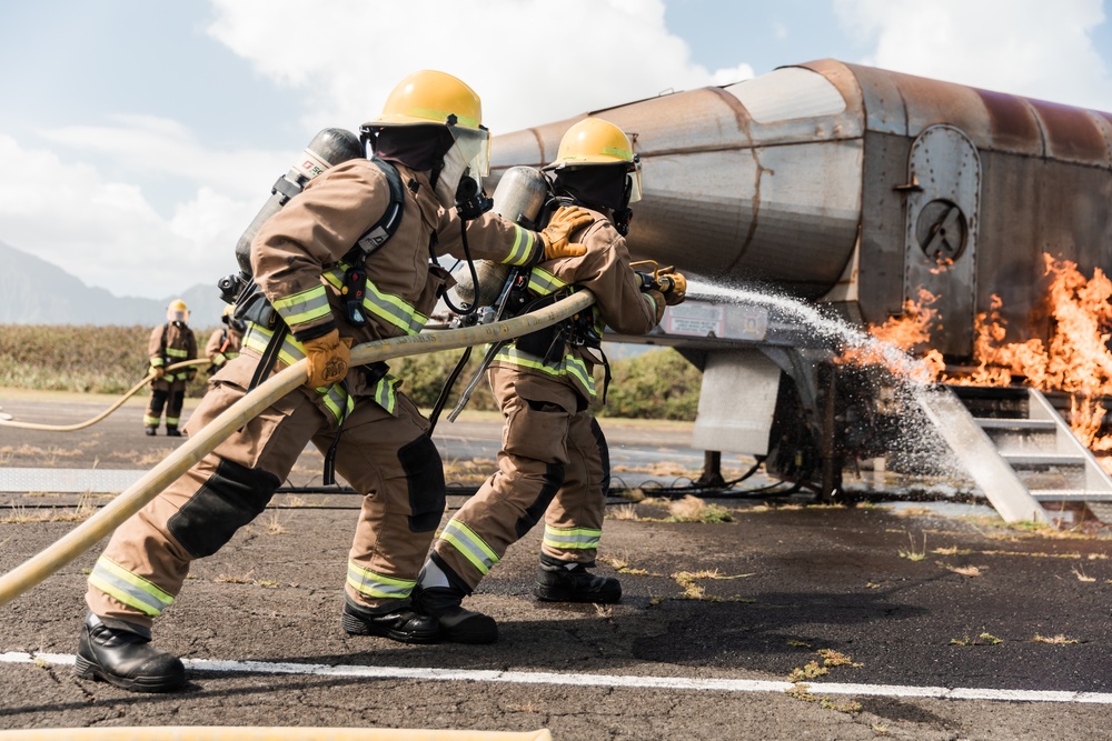 Distinguished Gentlemen Extinguish Small Fuel Fire Training