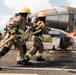 Distinguished Gentlemen Extinguish Small Fuel Fire Training