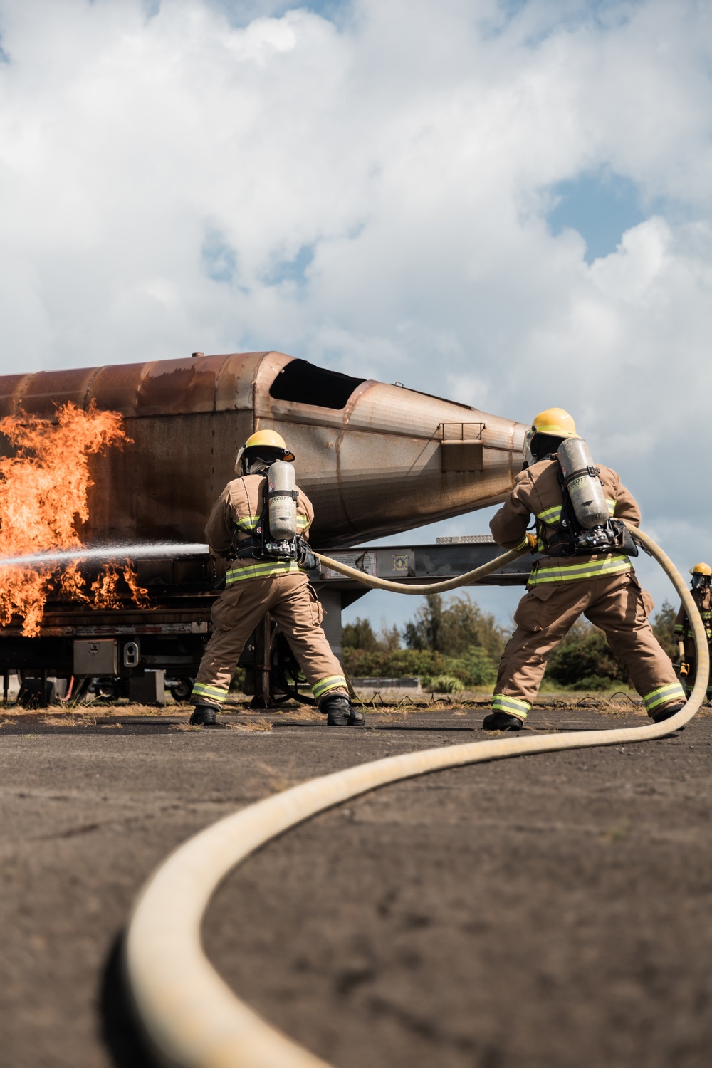 Distinguished Gentlemen Extinguish Small Fuel Fire Training