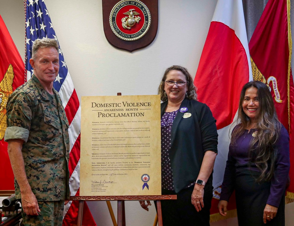 The Commanding General of MCIPAC signs Domestic Violence Awareness Month Proclamation