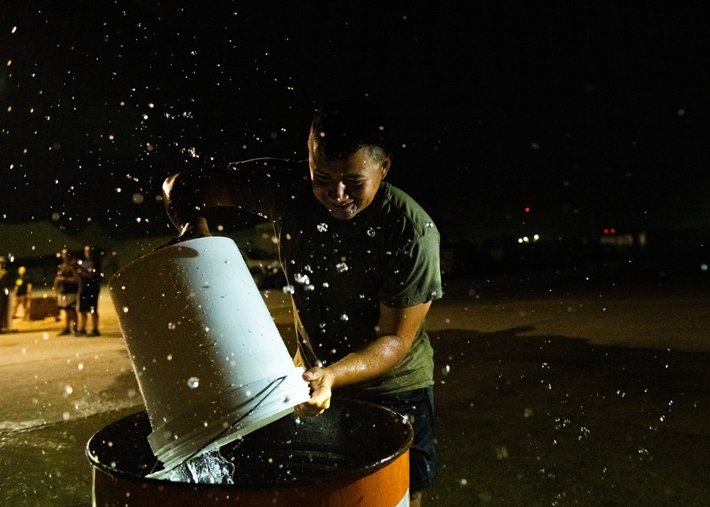 Airmen celebrate Fire Prevention Week with 'Bucket Brigade Challenge'