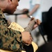 Marine Shares Passion for Music with Afghan Guests