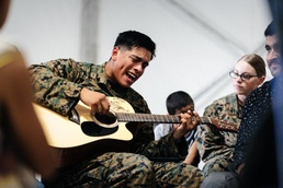 Marine Shares Passion for Music with Afghan Guests at Fort Pickett