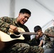 Marine Shares Passion for Music with Afghan Guests at Fort Pickett