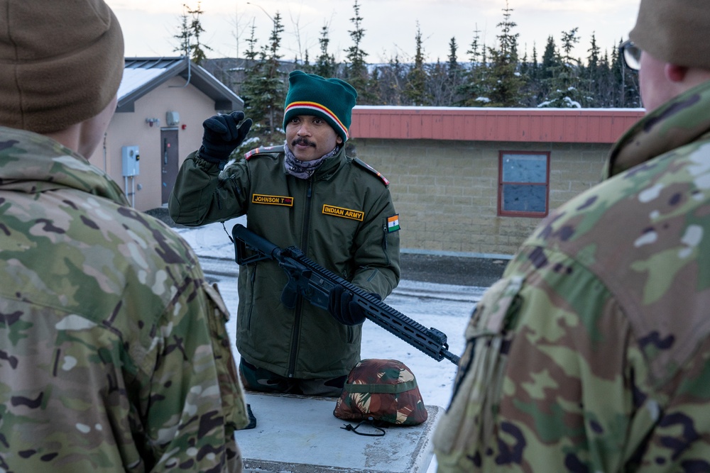 Spartan paratroopers and Indian Army troops conduct joint live fire training