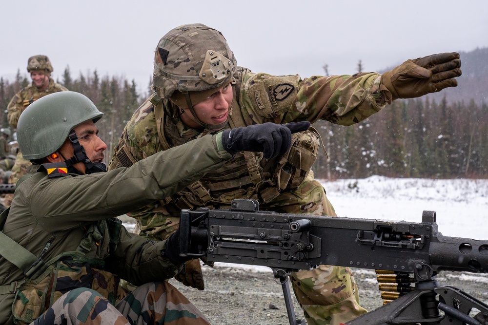 Spartan paratroopers and Indian Army troops conduct joint live fire training