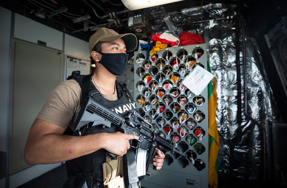 USS Tulsa Sailor Stands Security Watch