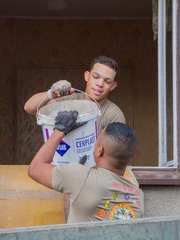 50th Regional Support Group Soldiers join community efforts to help renovate house in Poland