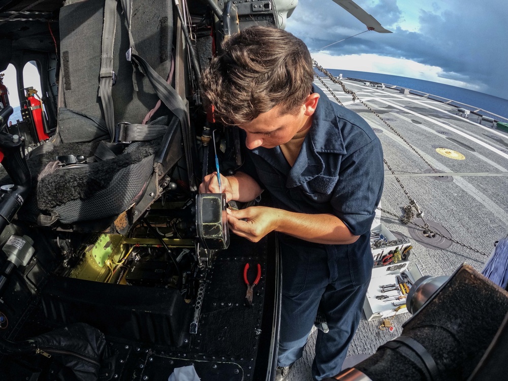 HSC 23 Sailor Performs Maintenance