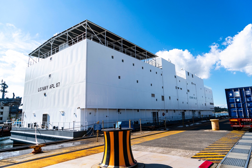 Newly Built Barracks Craft APL 67 Moored In Yokosuka