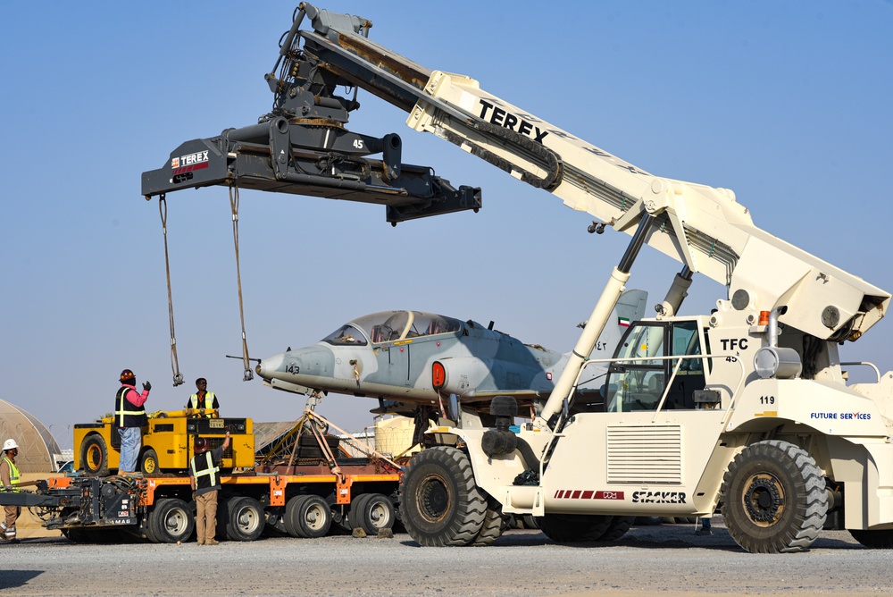 Multi-national forces transport Kuwait aircraft