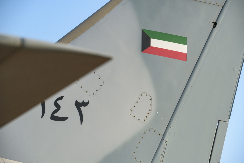 Multi-national forces transport Kuwait aircraft