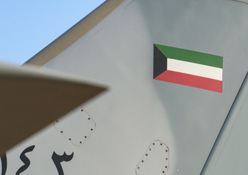 Multi-national forces transport Kuwait aircraft