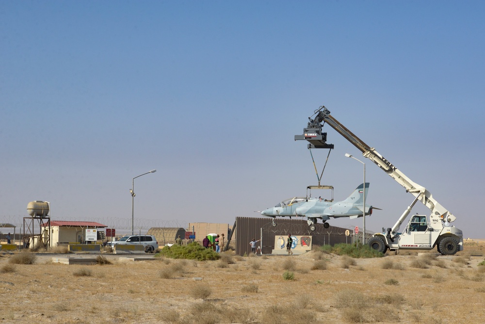 Multi-national forces transport Kuwait aircraft
