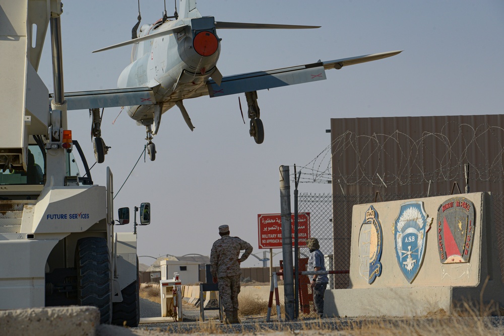 Multi-national forces transport Kuwait aircraft