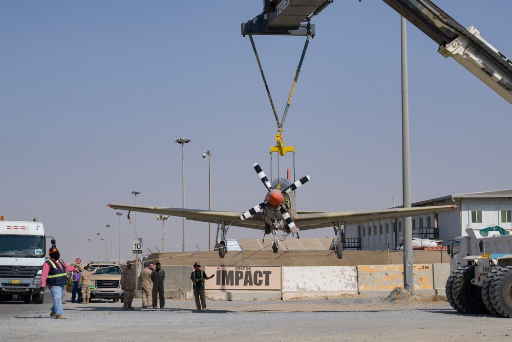 Multi-national forces transport Kuwait aircraft