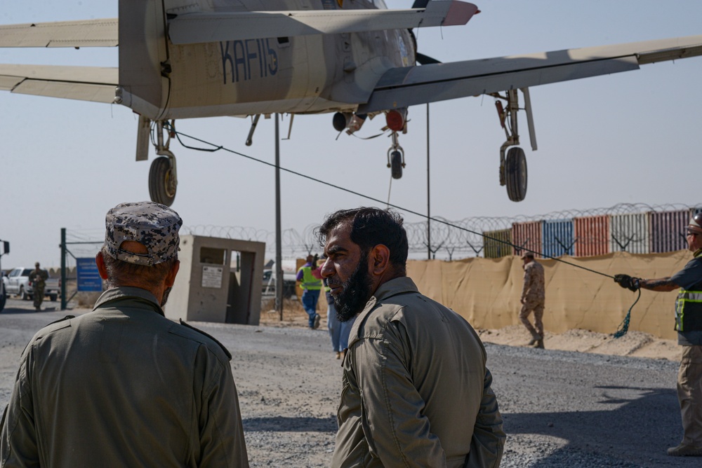 Multi-national forces transport Kuwait aircraft